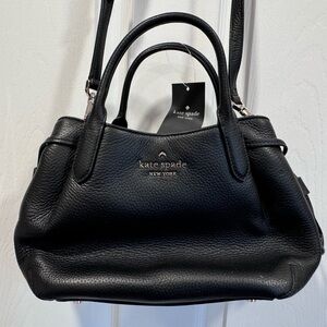 Kate Spade black pebbled leather dumpling brand new with tags.